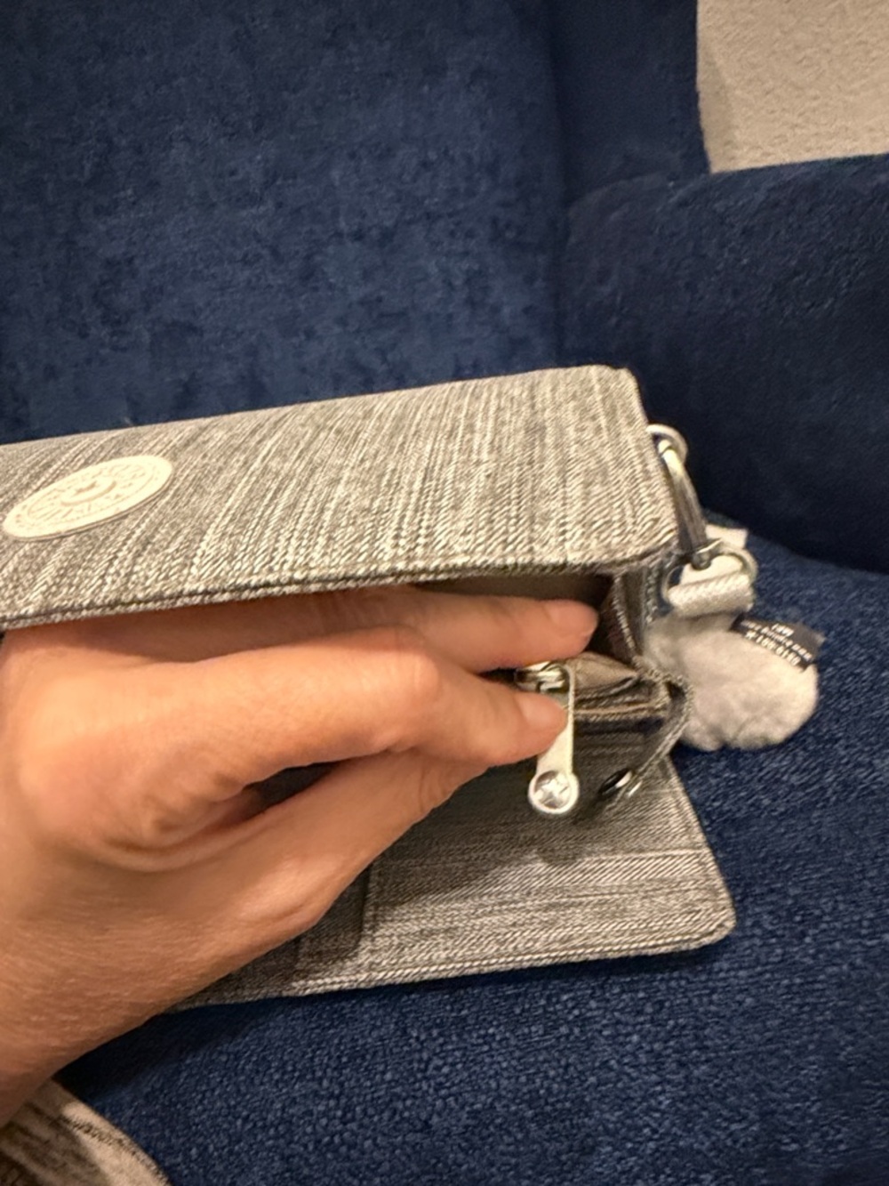 Kipling Light Gray Textured Clutch Wristlet with Pom Keychain - Picture 7 of 14